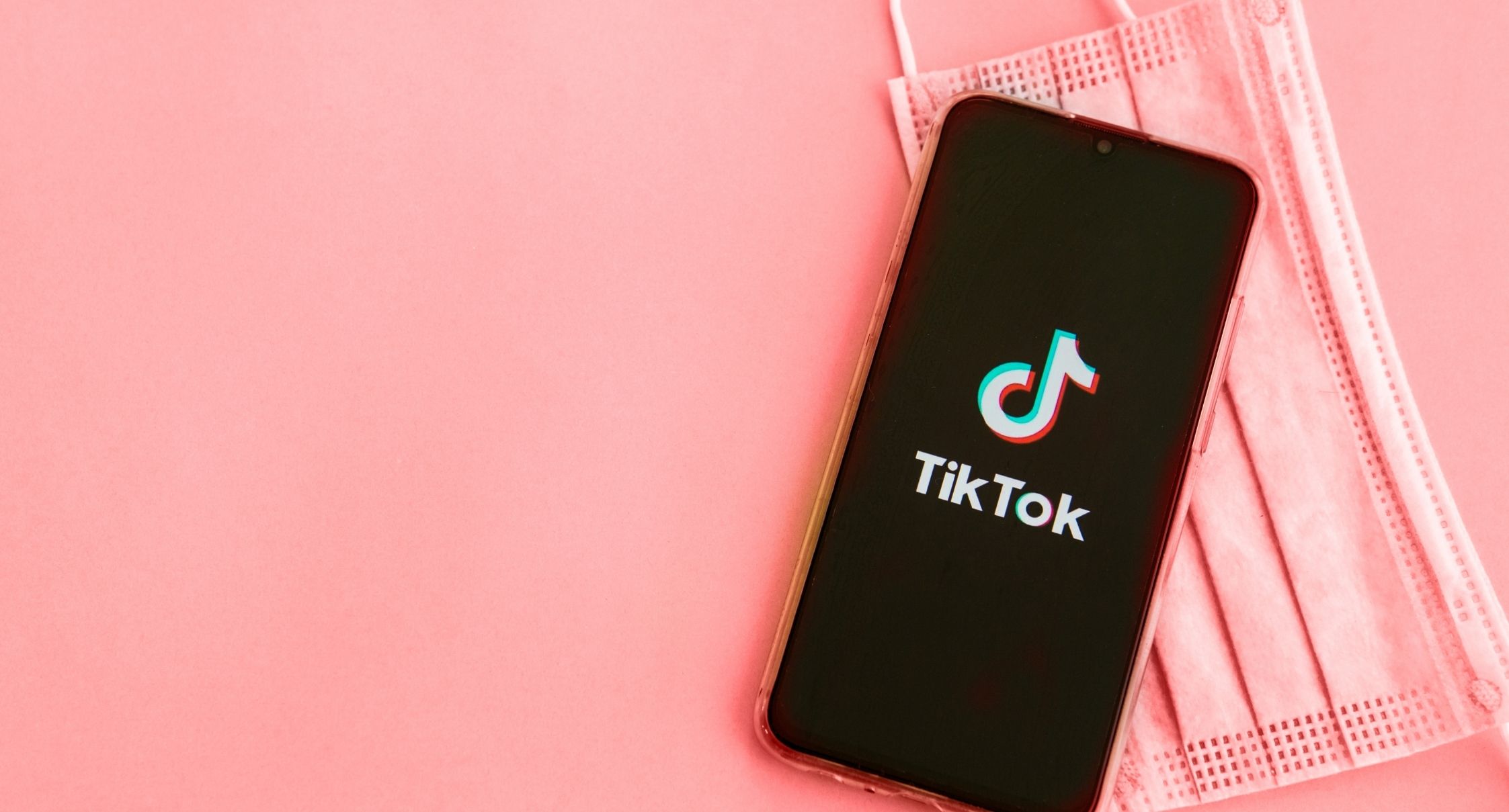 TikTok app on top of a mask